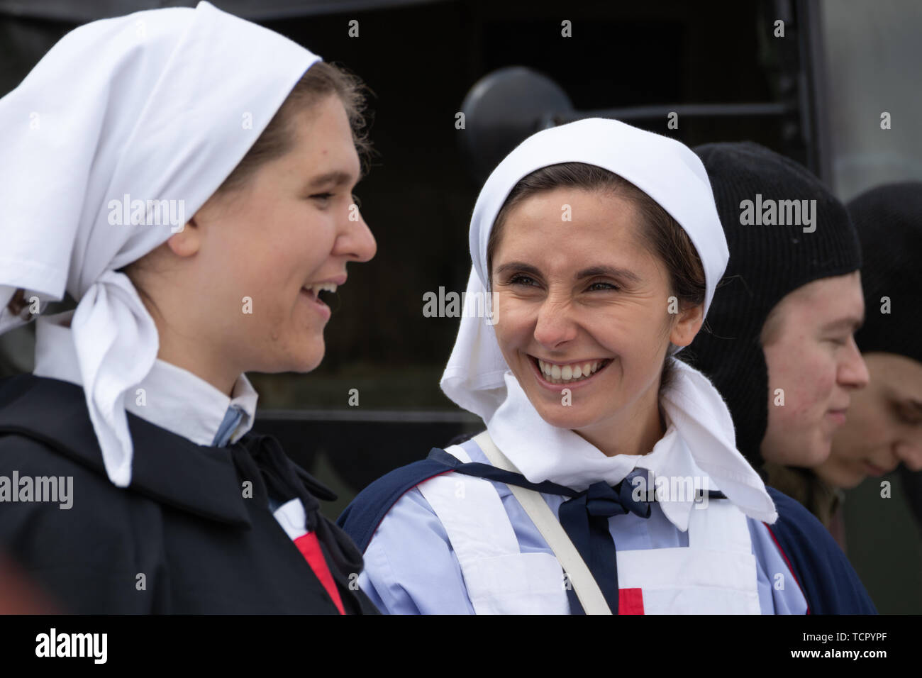 Two women dressed in authentic world war two nurses uniforms, People shots with period costumes Stock Photo