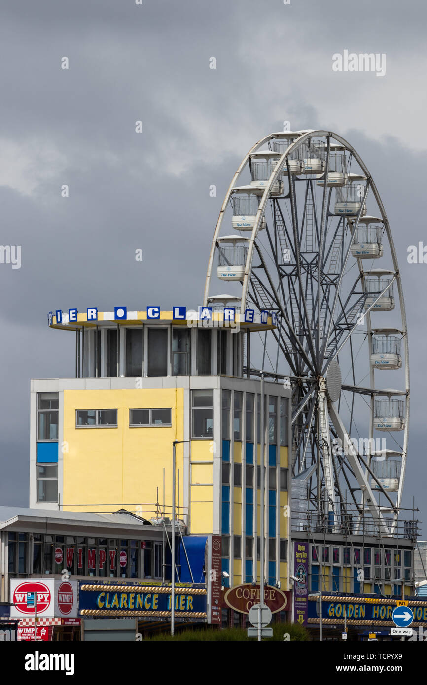 Clarence pier amusement arcade and fairground in southsea, Portsmouth with a large Ferris wheel