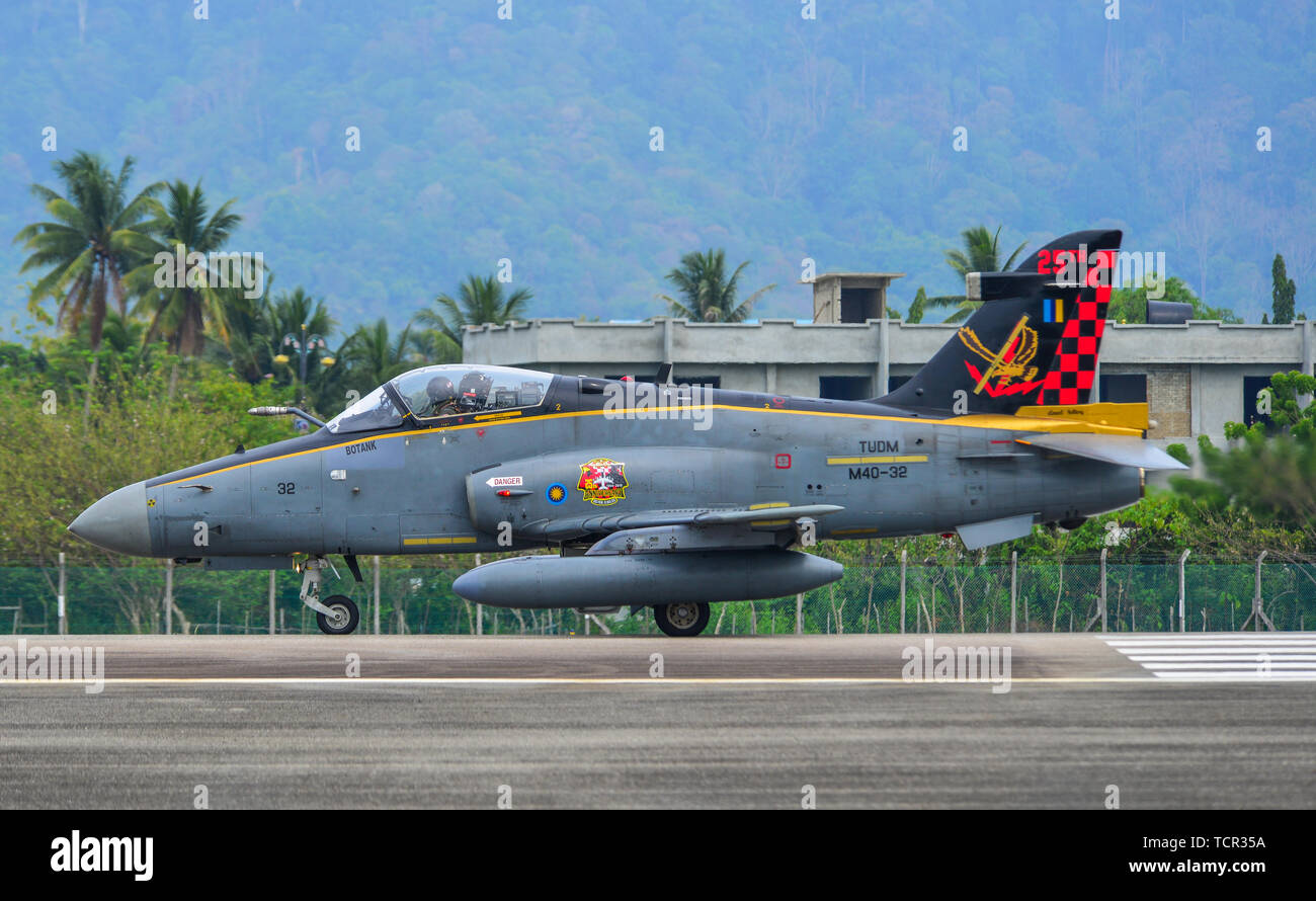 Langkawi, Malaysia - Mar 31, 2019. British Aerospace Hawk 200 of Royal Malaysian Air Force (TUDM M40-32) taxiing on runway of Langkawi Airport (LGK). Stock Photo