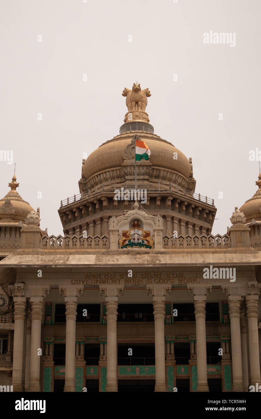 Indian Flag waving on the dome of Vidhana Soudha at Bangaluru, India Stock Photo