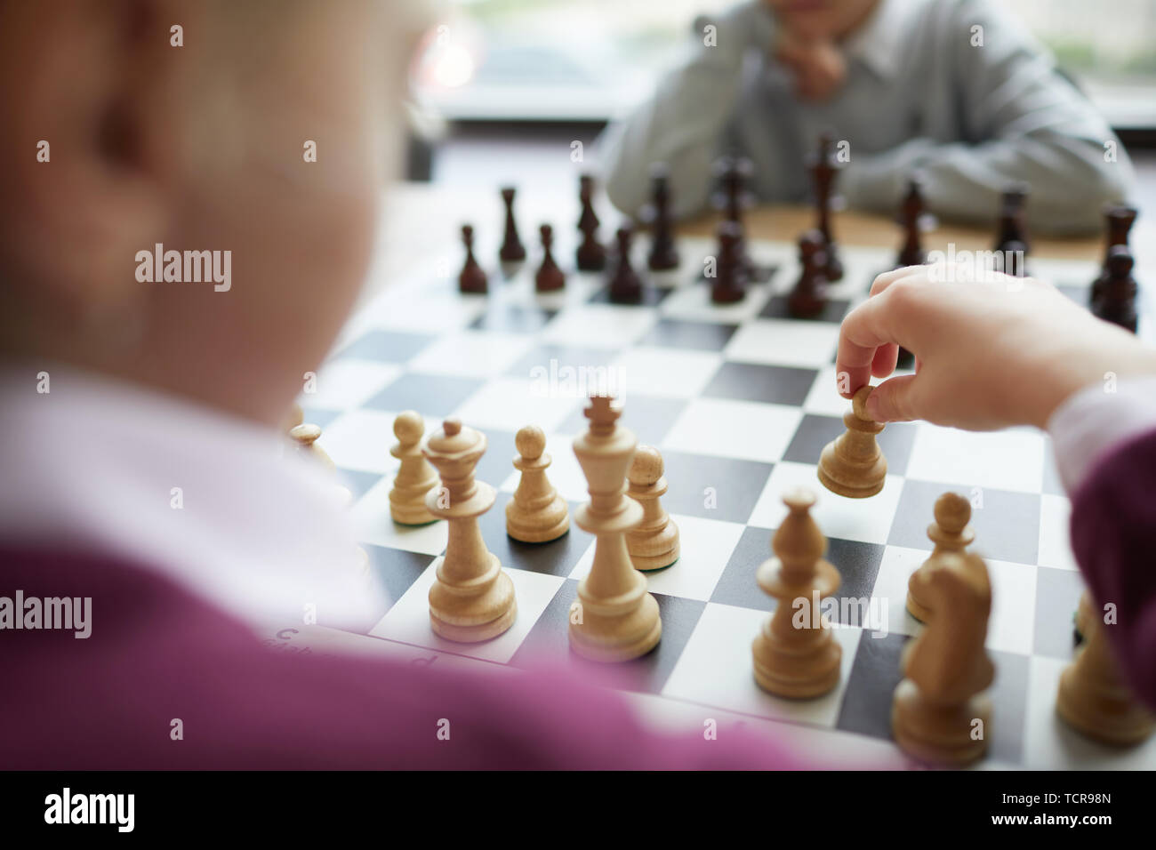 A chess player making his next chess move, Stock image