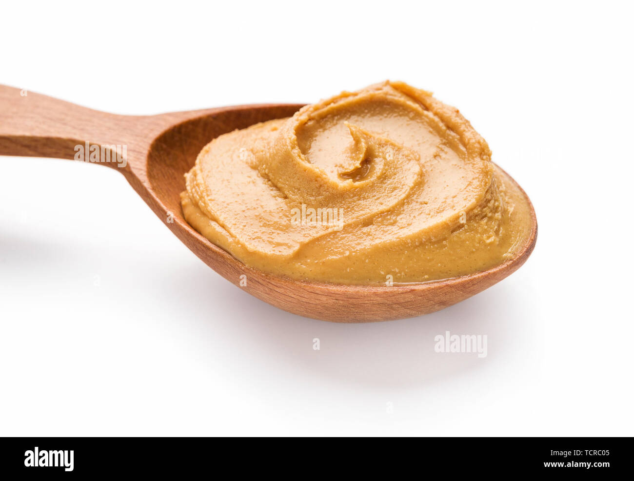 Spoon with peanut butter Stock Photo Alamy