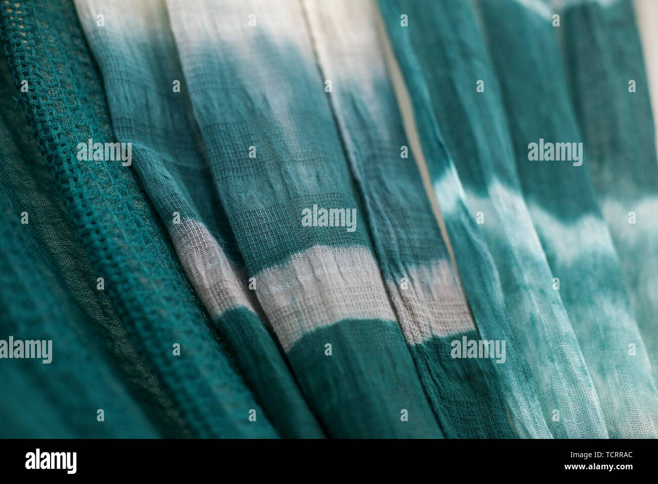 Batik braid glowing dots abstract background Stock Photo