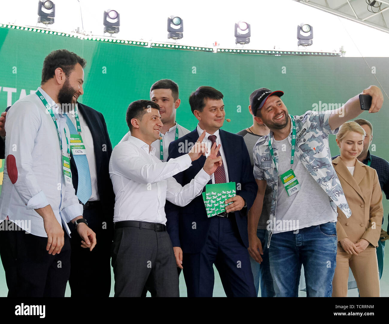 Ukrainian President Volodymyr Zelensky (C) poses for a selfie during the  congress of the pro-presidential Servant in Kiev, Ukraine. The  pro-presidential Servant of the People political party (Sluga Narodu), is  the leader