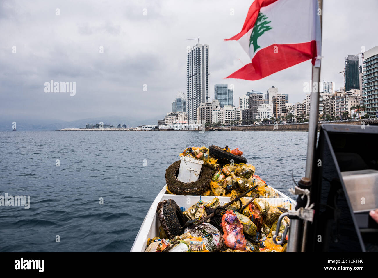 Trash cleared by Calypso Dive Club members from the sea along Beirut's Corniche during the clean up day. Lebanese people came out to help with a National Beach Clean up Day spearheaded by the Lebanese Minister for Environment. Not only did they collect trash from their beaches at over 150 locations, teams of scuba divers also spent their day underwater, clearing up everyone's waste from the ocean floor. Beirut, Lebanon. Stock Photo