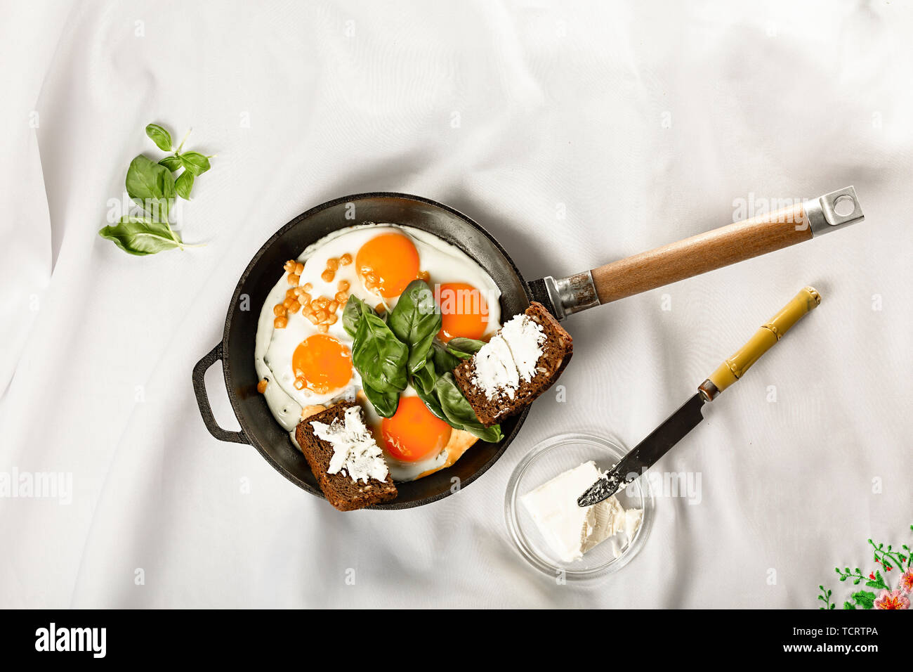 cast iron,stainless s,teel,iron skillet,cooking,olive oil,non stick,nonsticksunny side,egg molds,yolkpng,cookware Stock Photo