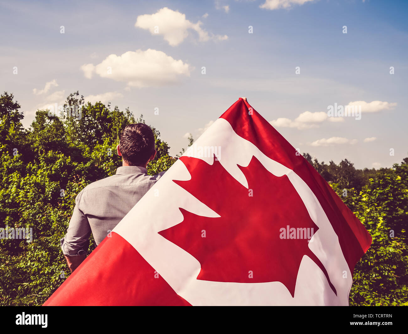 Holding canadian flag close up hi-res stock photography and images - Alamy
