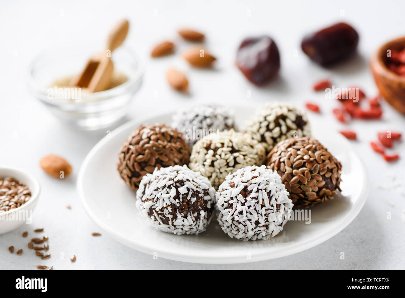 Tasty vegan protein truffles or candy or energy balls made with dates