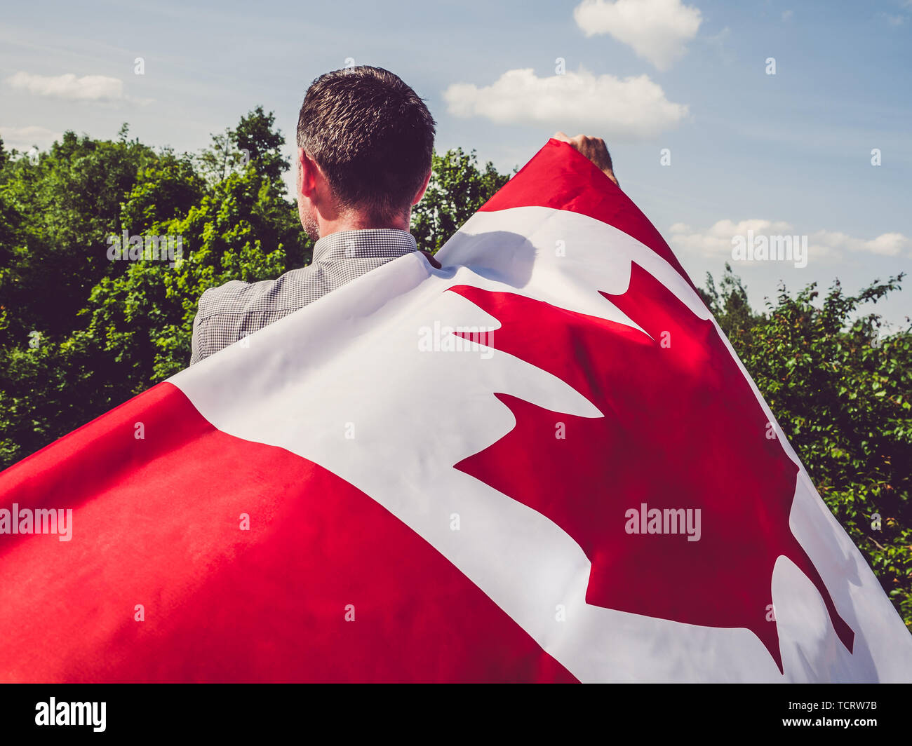 Holding canadian flag close up hi-res stock photography and images - Alamy