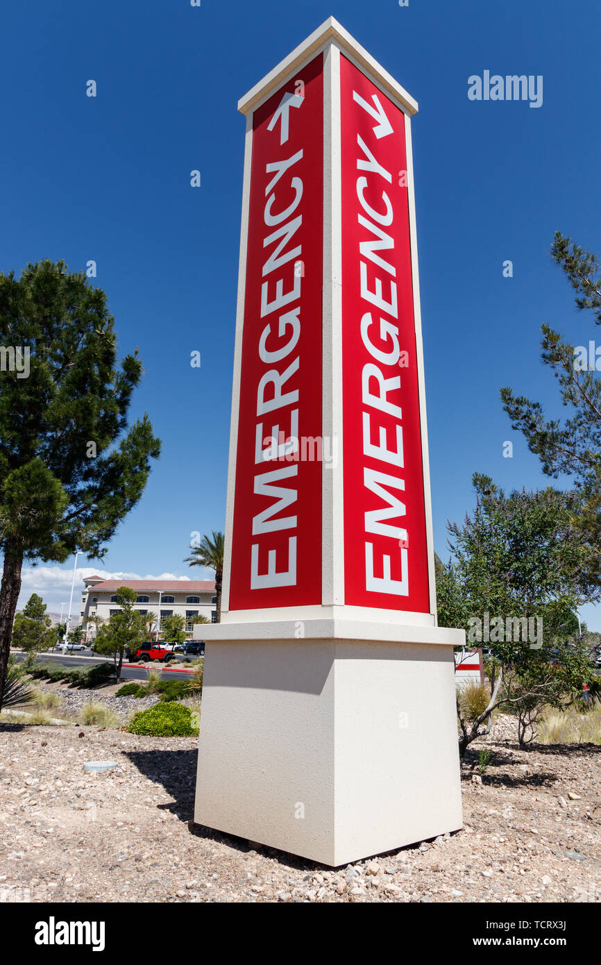 Red Emergency Entrance Sign for a Local Hospital Stock Photo