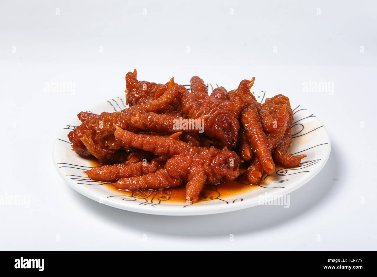Tiger skin, phoenix claws, halogen chicken claws Stock Photo Alamy