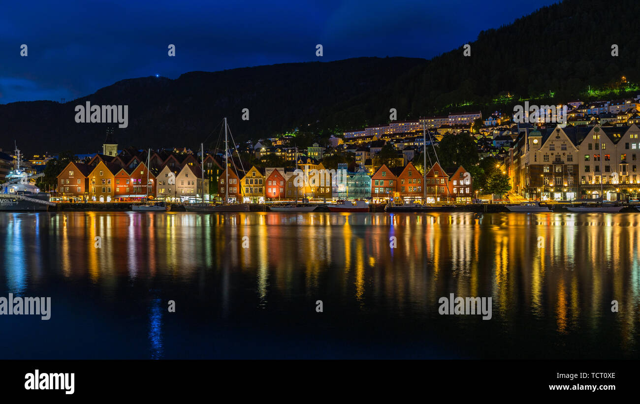 Bergen night cityscape with traditional wooden houses part of Bryggen historic district, UNESCO World Heritage Site. Bergen, Norway, August 2018 Stock Photo