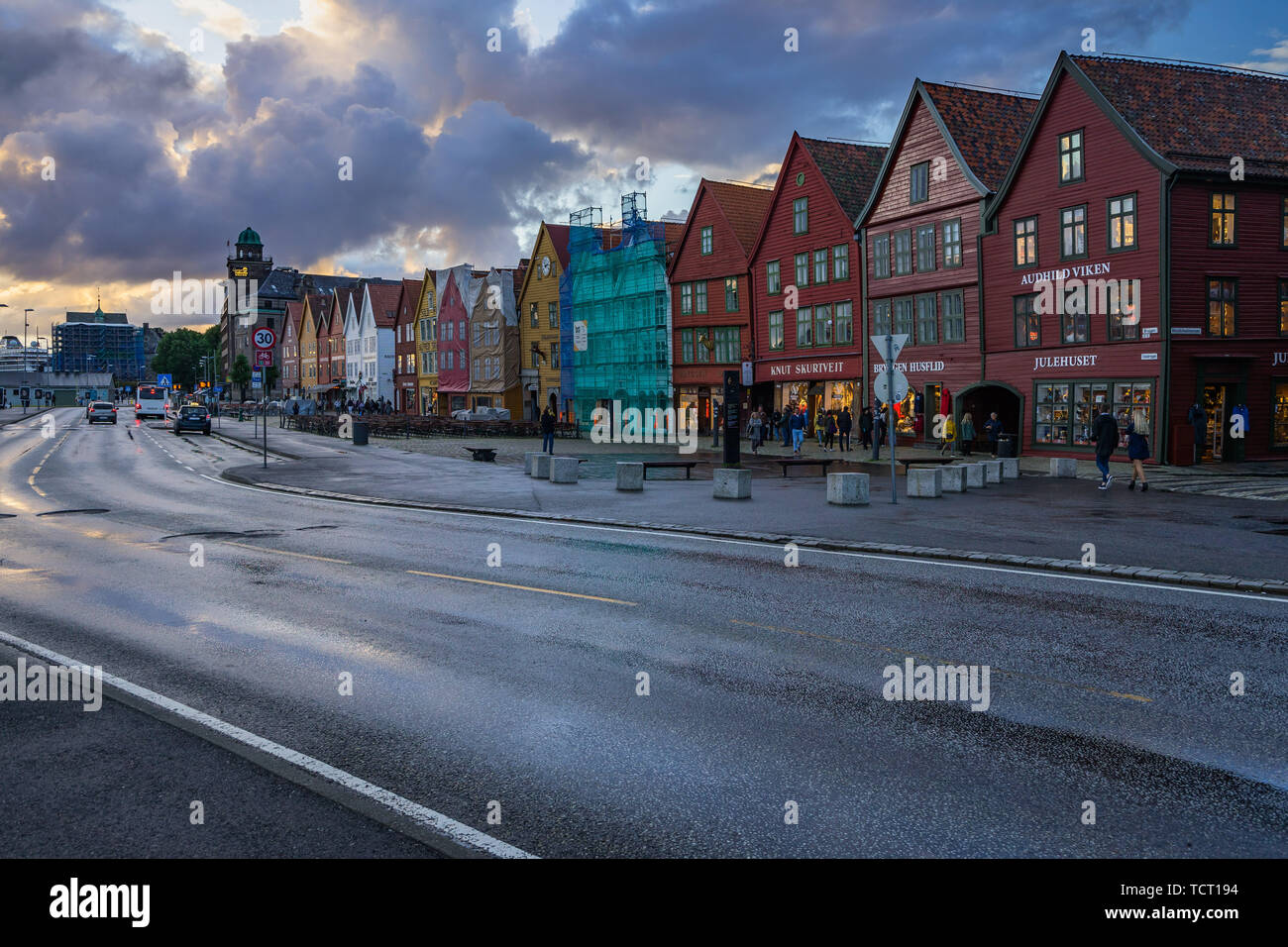 Scenic sunset and clouds over Bryggen waterfront, the historic district of Bergen and UNESCO World Heritage Site. Bergen, Norway, August 2018 Stock Photo
