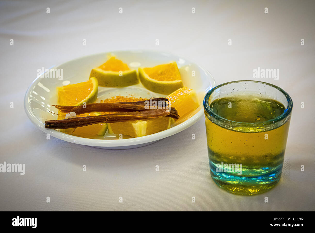 Mezcal or mescal is a distilled alcoholic beverage made from any type of agave. Stock Photo