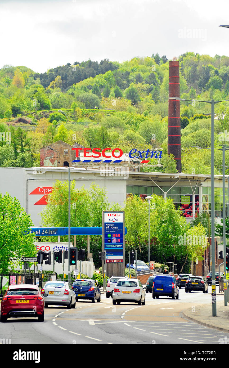 Tesco extra store on Centenary Way,Burnley, set against mill chimney