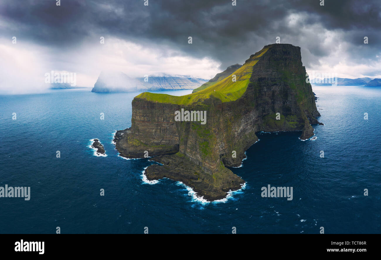 Aerial panorama of massive cliffs of Kalsoy on Faroe Islands Stock Photo