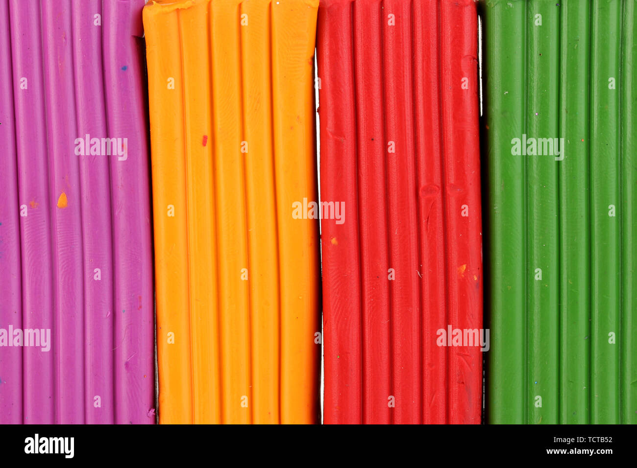 Children bright plasticine background close-up Stock Photo