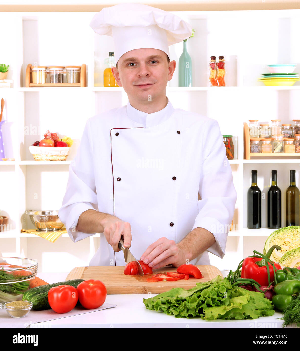 Chef cooking in kitchen Stock Photo - Alamy