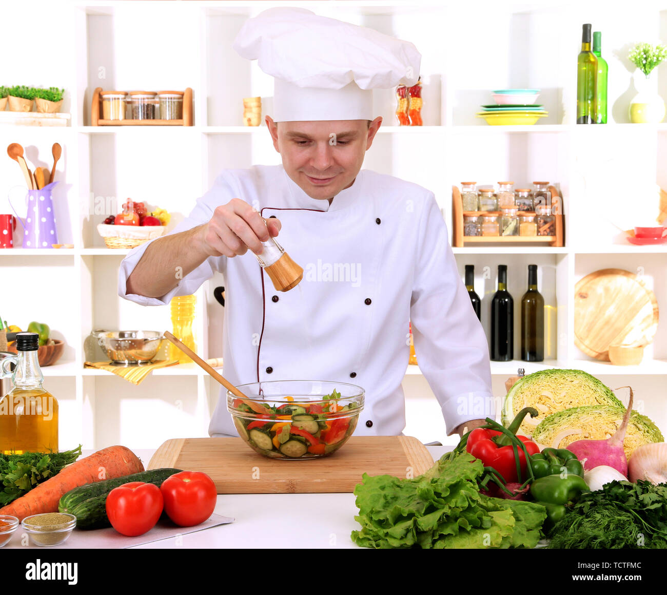 Chefi Coocking Chef cooking in kitchen Stock Photo - Alamy