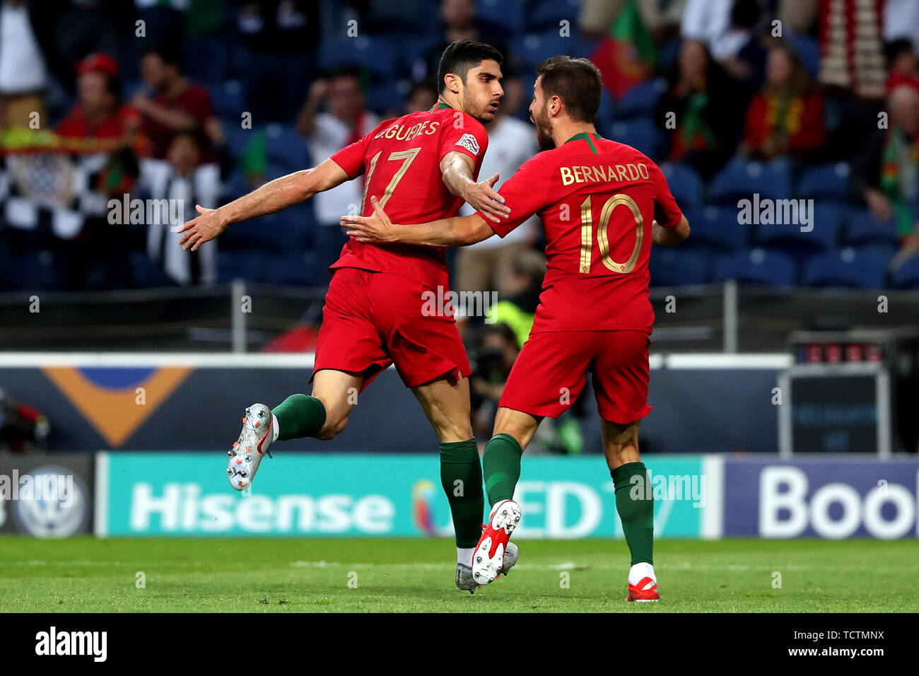 Porto, Portugal. 9th June, 2019. Goncalo Guedes (L) of Portugal celebrates with his teammate Bernardo Silva after scoring a goal during the UEFA Nations League Final football match between Portugal and the Netherlands, at the Dragao stadium in Porto, Portugal, on June 9, 2019. Credit: Pedro Fiuza/Xinhua/Alamy Live News Stock Photo
