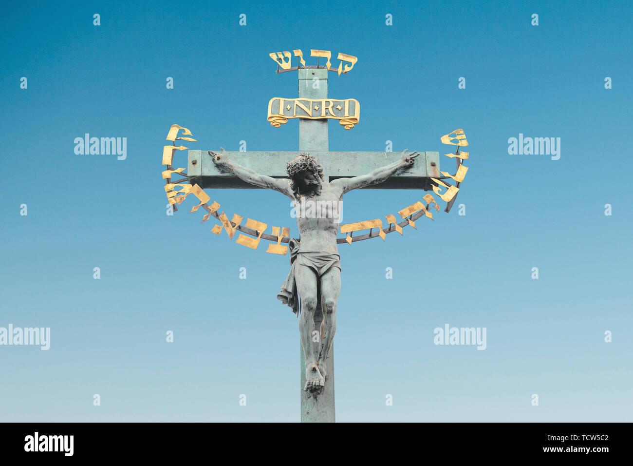 The statue of Jesus Christ on the Charles Bridge in Prague, Czech