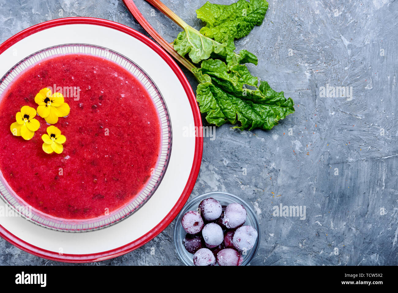 Seasonal summer fruit soup.Soup with strawberries.Cold soup.Fruit soup. Stock Photo