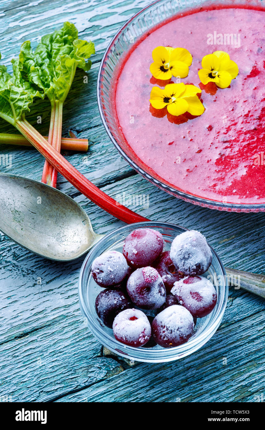 Summer cool soup with cherry and rhubarb.Fruit soup. Summer food. Stock Photo