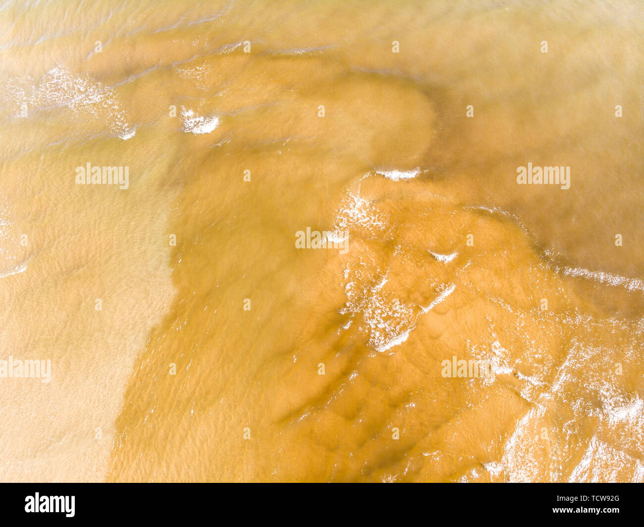 Aerial view of a beach with sand and waves, in Denia, Spain Stock Photo