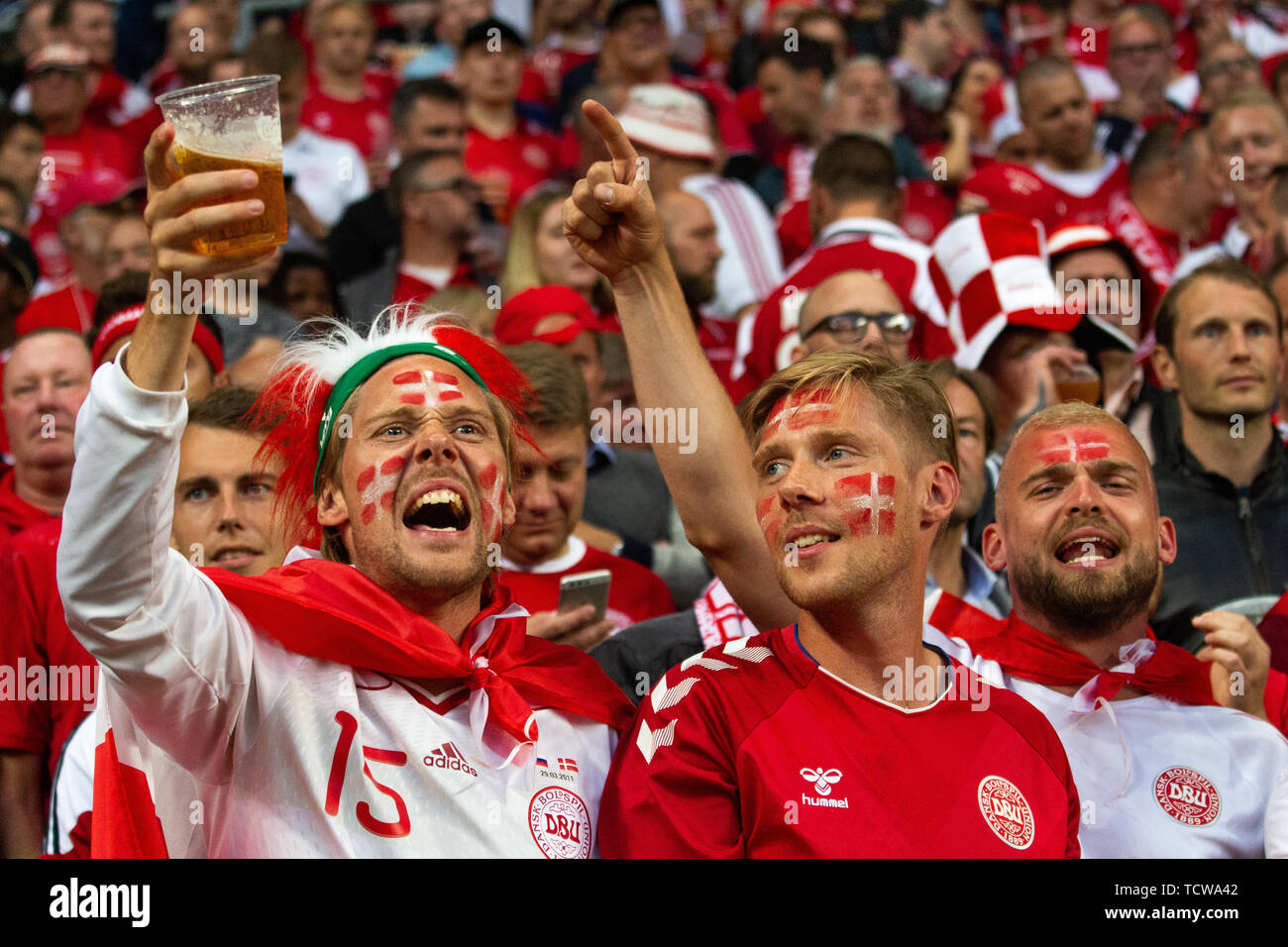 Denmark, Copenhagen - June Fans of Denmark, so called Roligans, support the Danish team during the EURO 2020 between Denmark and Ireland at Telia Parken in Copenhagen. (Photo credit: