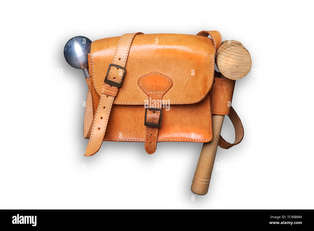 A  leather bag with tools for  Boellerschiessen. Boellerschiessen in Germany or Prangerschiessen in Austrian is the saluting gun shooting tradition th Stock Photo