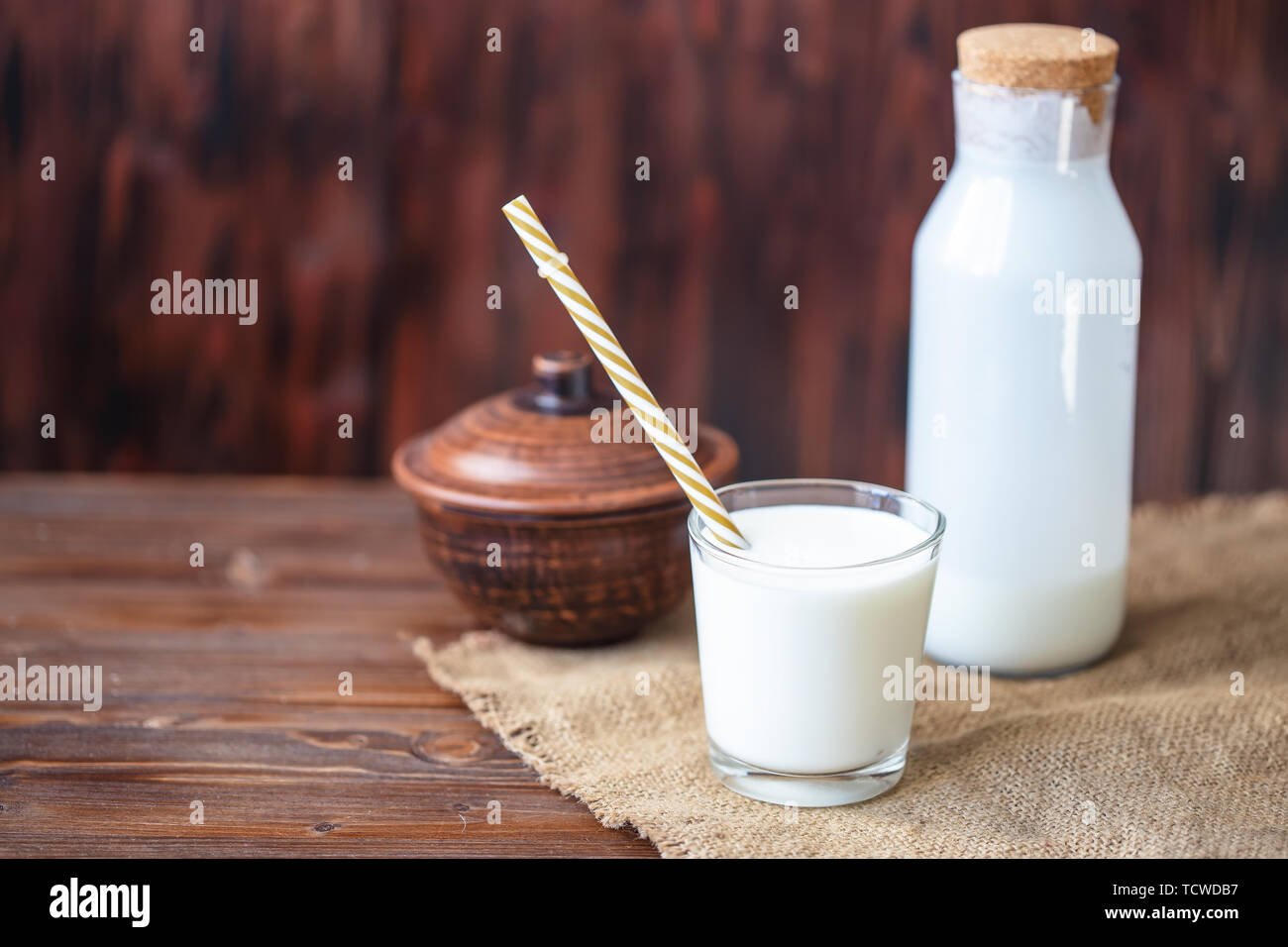 Homemade kefir, yogurt with probiotics in a glass on table Probiotic cold fermented dairy drink Trendy food and drink Copy space Rustic style. Stock Photo
