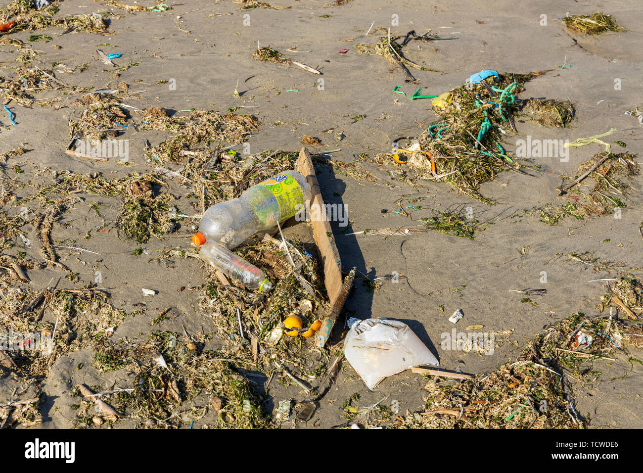 Discarded plastic bottles and other rubbish on the beach in Paracas, Peru, South America, Stock Photo