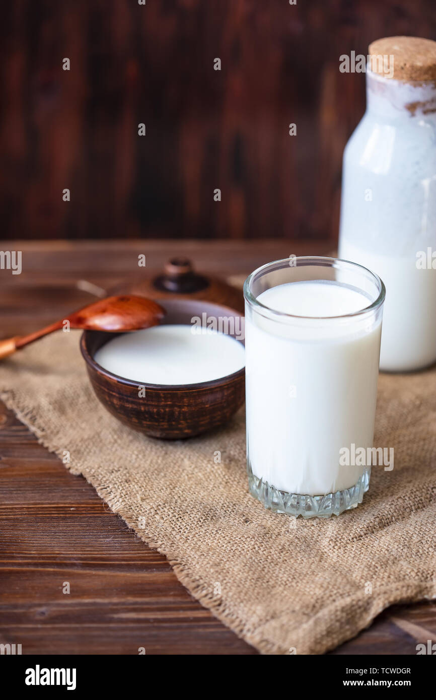 Homemade kefir, yogurt with probiotics in a glass on table Probiotic cold fermented dairy drink