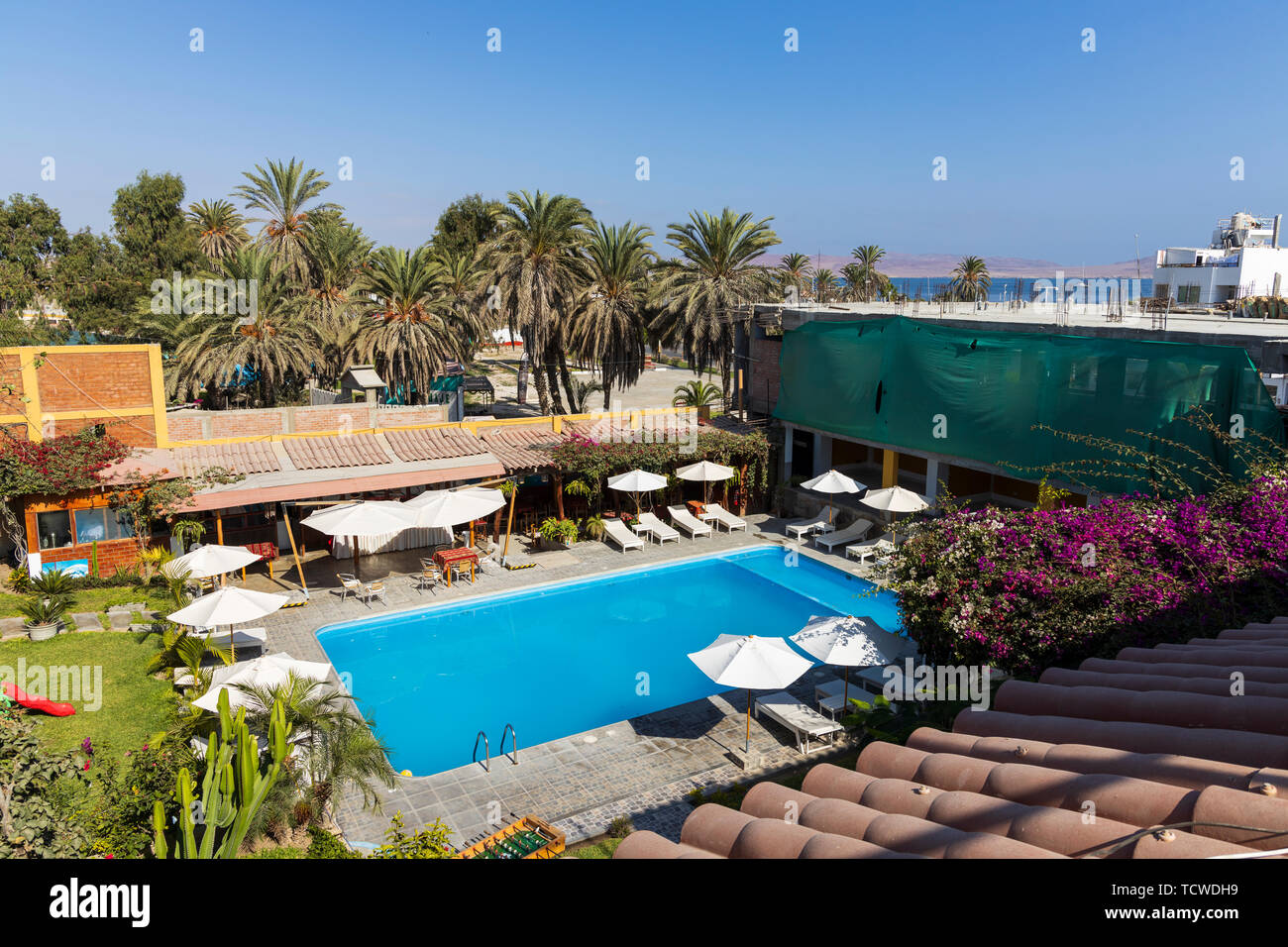 Aerial view of swimming pool area of a hotel in Paracas, Peru, South America, Stock Photo