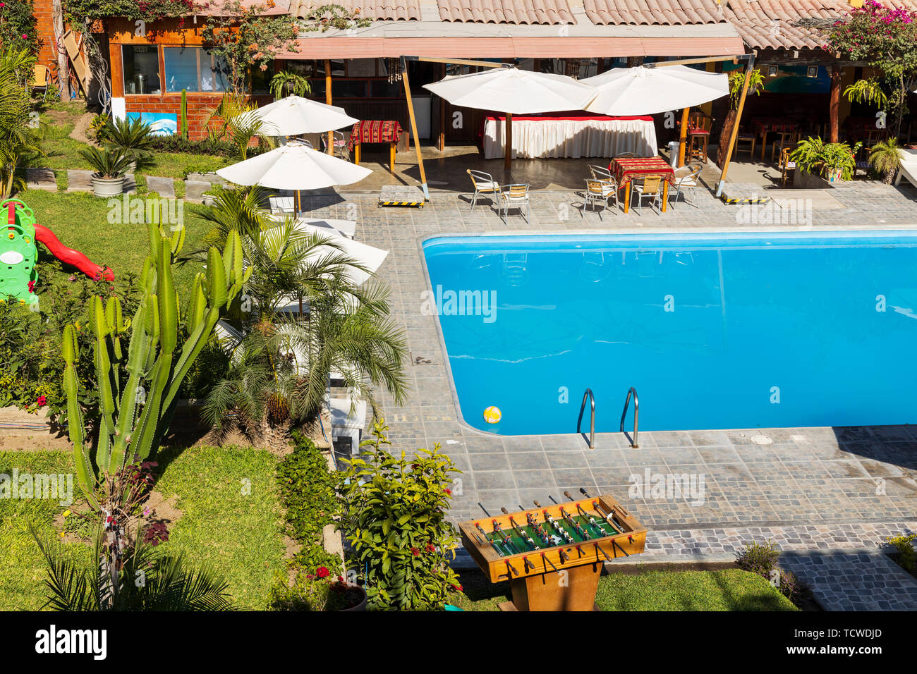 Aerial view of swimming pool area of a hotel in Paracas, Peru, South America, Stock Photo