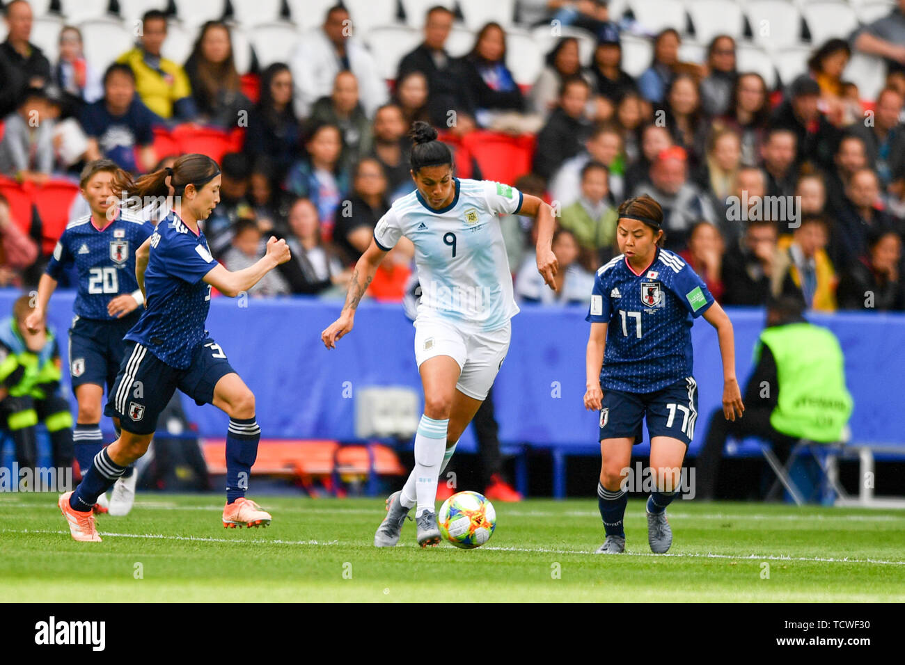 10 june 2019 Paris, France Soccer Women's World Cup France 2019: Argentina v Japan   Two japanese Players try to stop Florencia Soledad Jaimes (Argentinien) (9) Stock Photo