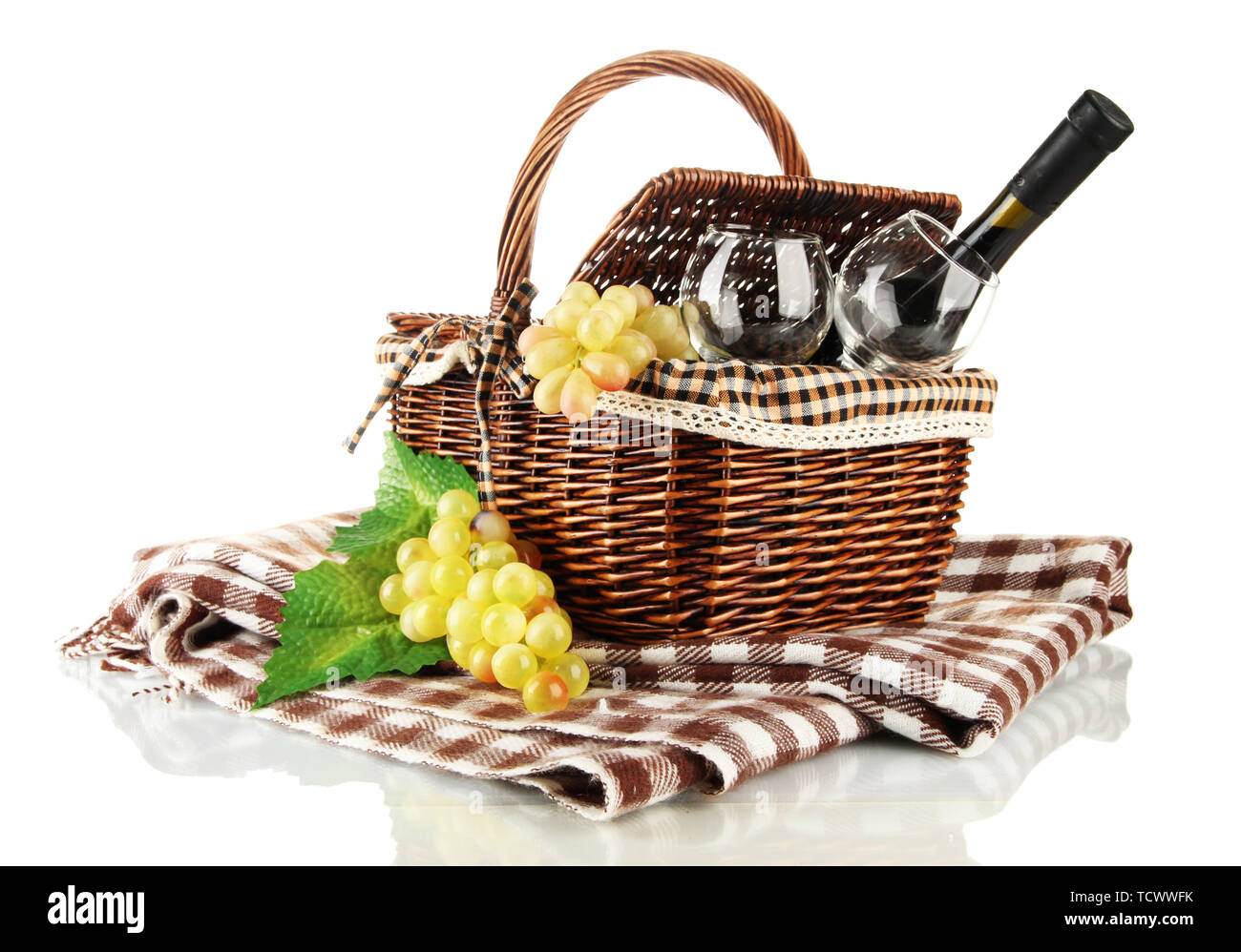 Picnic basket with fruits and bottle of wine isolated on white Stock ...