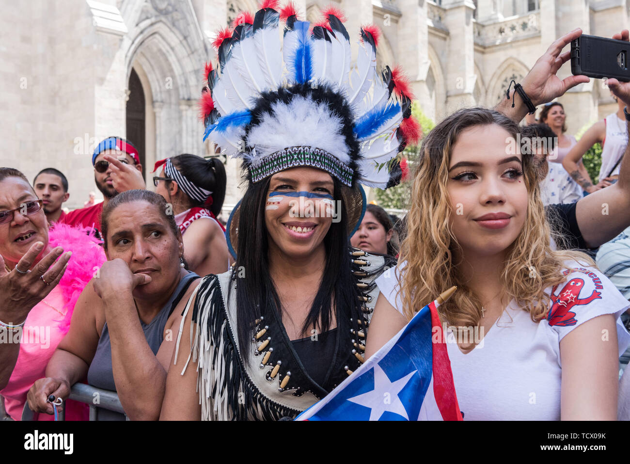 New York, USA. 09th June, 2019. On June 9, 2019, millions of people lined the streets along 5th Avenue in Midtown Manhattan celebrating their Puerto Rican heritage. In its 62nd year, the National Puerto Rican Day Parade is the largest parade of Puerto Rican culture. This year's theme was "Un Pueblo, Muchas Voces" (One Nation, Many Voices) celebrating the diversity of Puerto Rico. Credit: Gabriele Holtermann-Gorden/Pacific Press/Alamy Live News Stock Photo