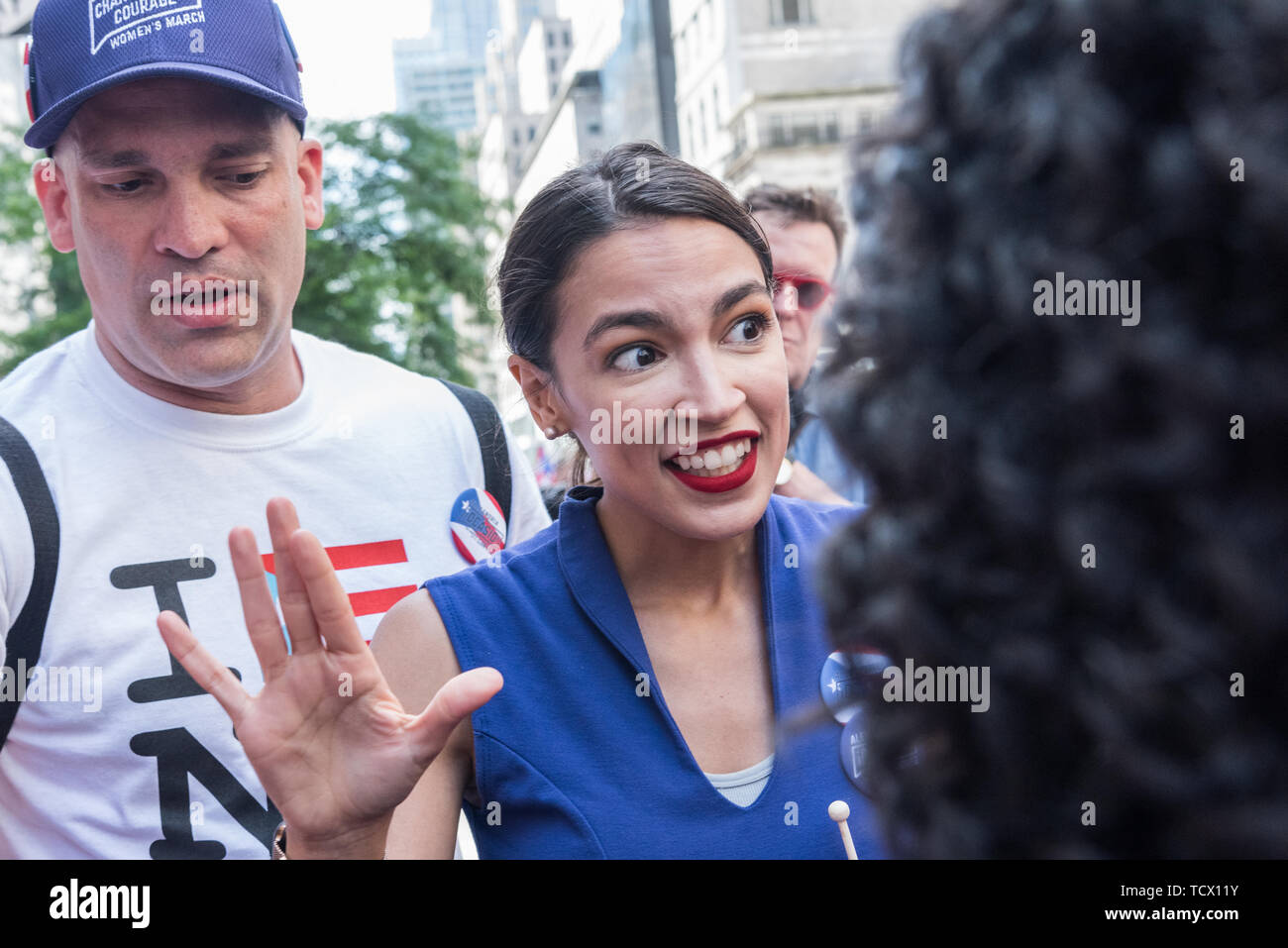 New York, USA. 09th June, 2019. Congresswoman Alexandria Ocasio-Cortez - On June 9, 2019, millions of people lined the streets along 5th Avenue in Midtown Manhattan celebrating their Puerto Rican heritage. In its 62nd year, the National Puerto Rican Day Parade is the largest parade of Puerto Rican culture. This year's theme was 'Un Pueblo, Muchas Voces' (One Nation, Many Voices) celebrating the diversity of Puerto Rico. Credit: Gabriele Holtermann-Gorden/Pacific Press/Alamy Live News Stock Photo