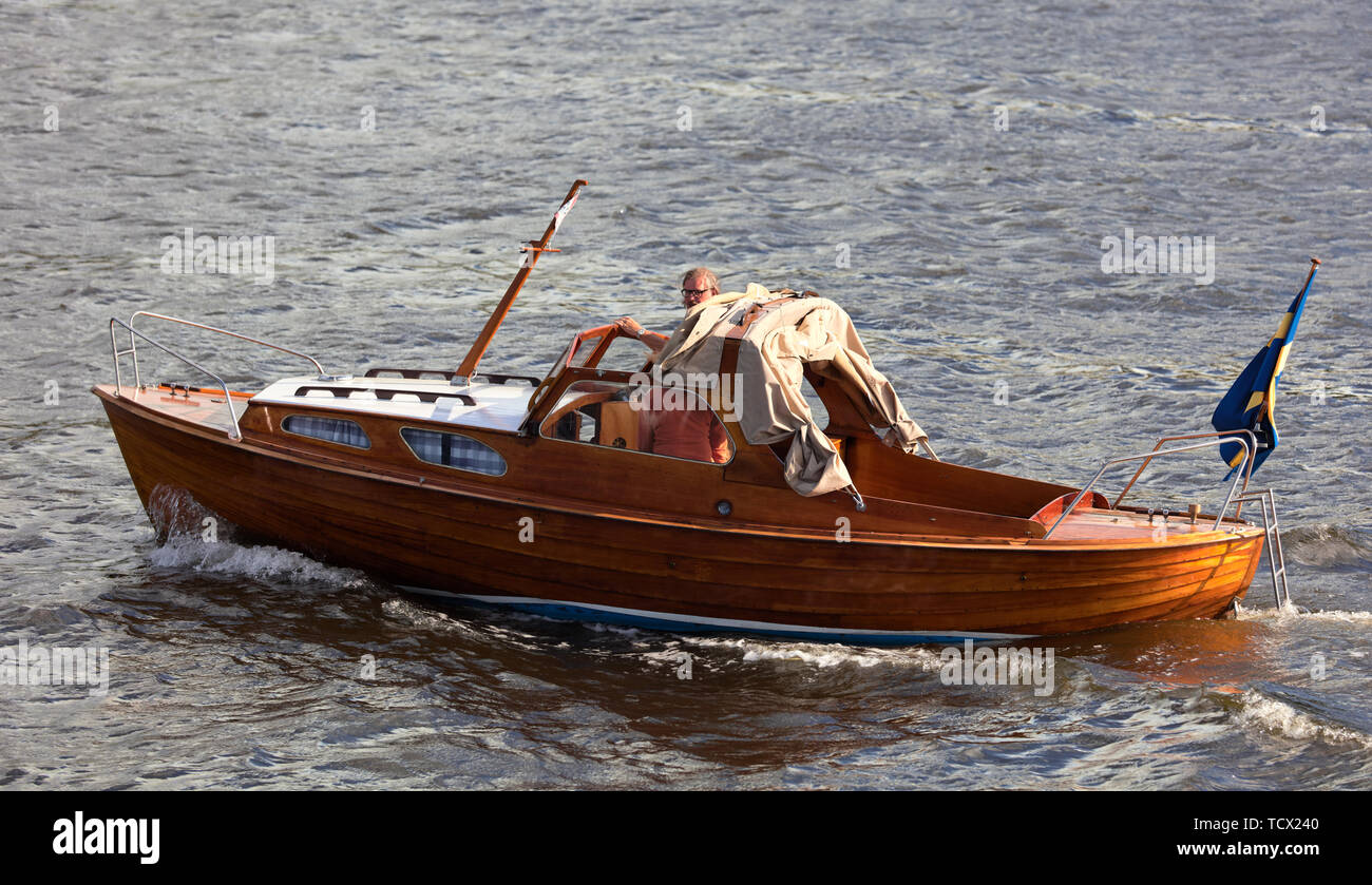 Old wooden boat outside Kvarnholmen, Stockholm, Sweden Stock Photo