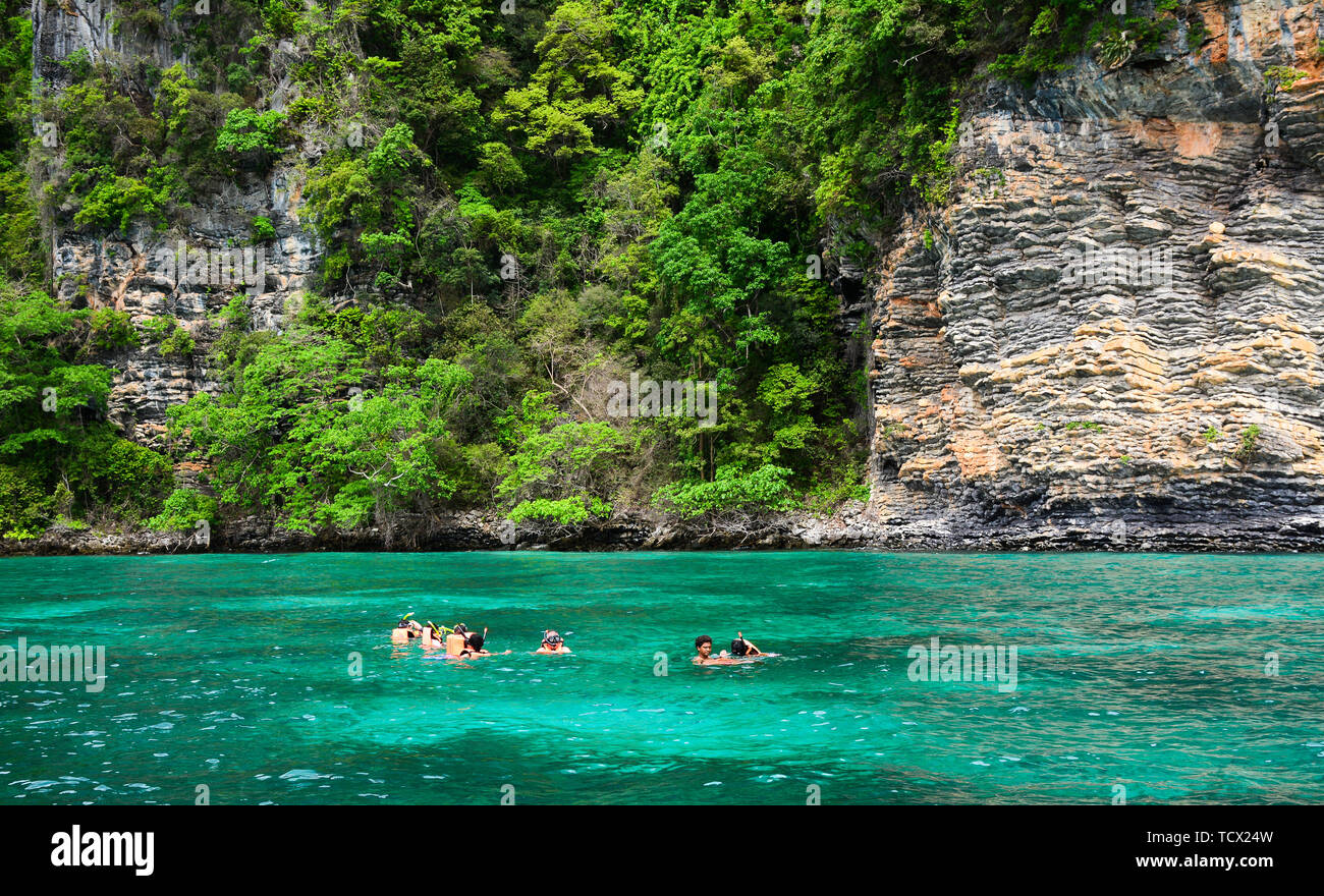 Phuket, Thailand Jun 20, 2016. Tourist snorkeling in clear and shallow water of Phuket Island