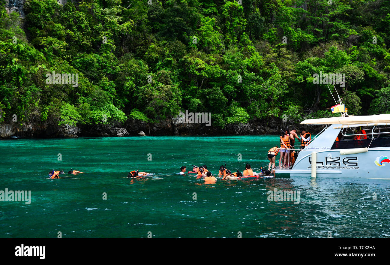 Phuket, Thailand Jun 20, 2016. Tourist snorkeling in clear and shallow water of Phuket Island