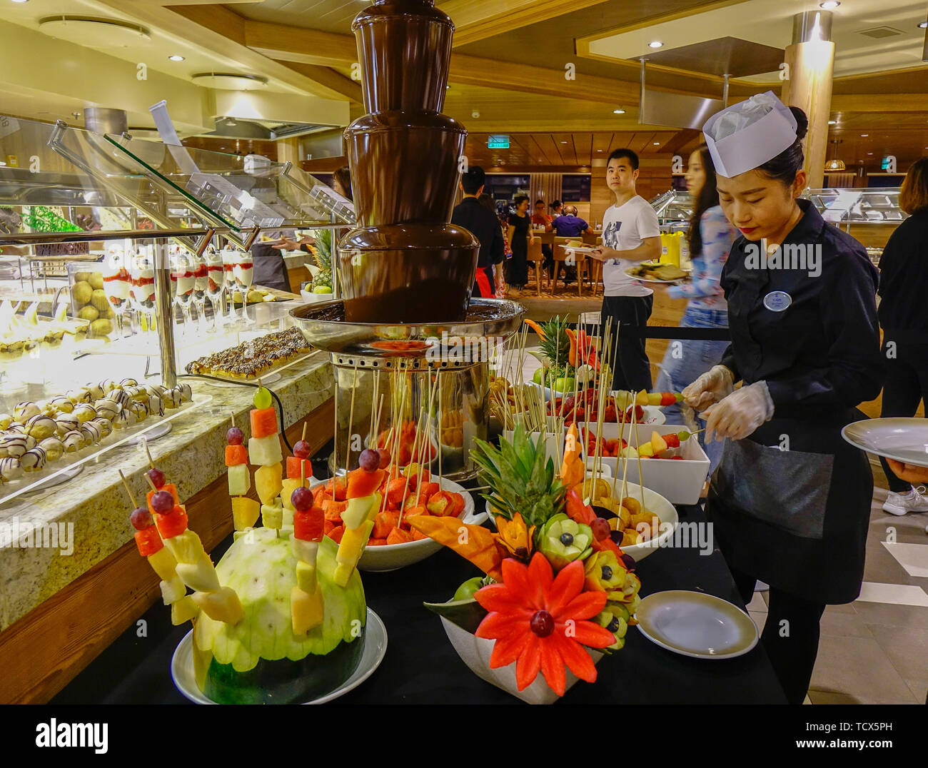 Shanghai, China - Jun 3, 2019. Chocolate fountain with fresh fruits at the buffet  restaurant of Royal Caribbean Cruise Ship Spectrum of the Seas Stock Photo  - Alamy