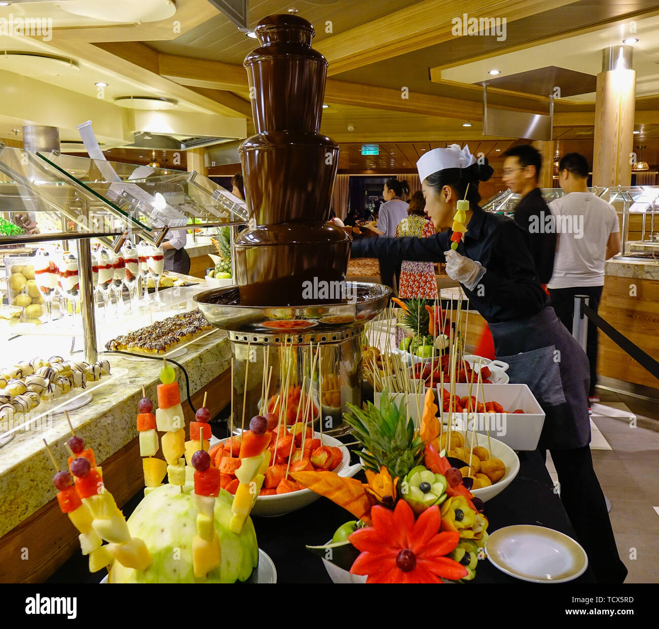 Shanghai, China - Jun 3, 2019. Chocolate fountain with fresh fruits at the buffet  restaurant of Royal Caribbean Cruise Ship Spectrum of the Seas Stock Photo  - Alamy