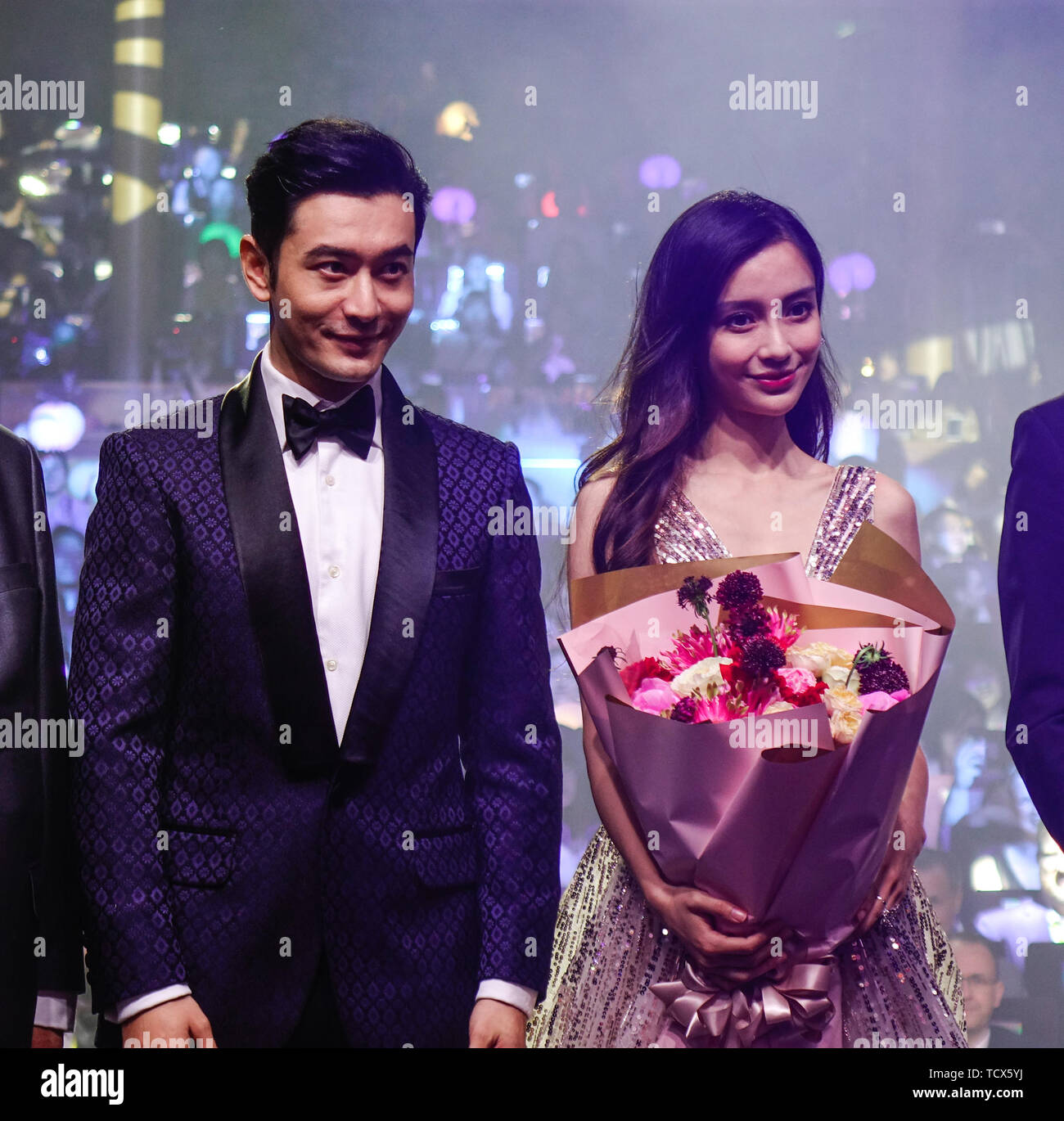 Shanghai, China - Jun 3, 2019. Famous Chinese movie star Huang Xiaoming and Angela Yeung Wing in the party on Spectrum of the Seas cruise ship. Stock Photo