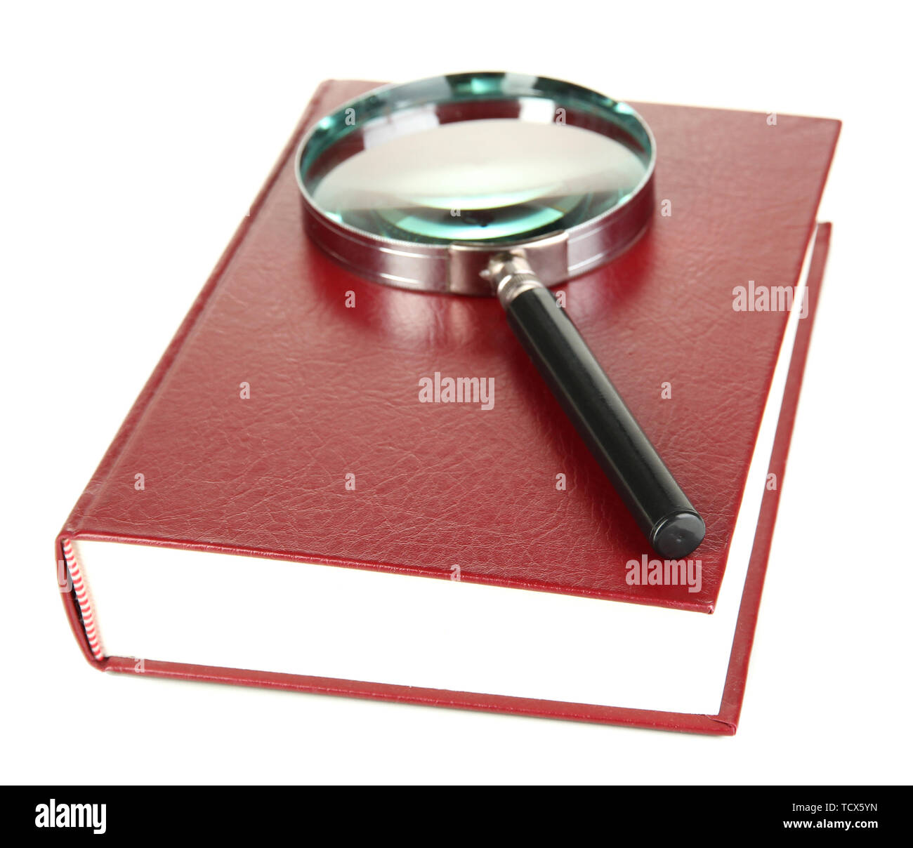 Magnifying glass and book isolated on white Stock Photo - Alamy