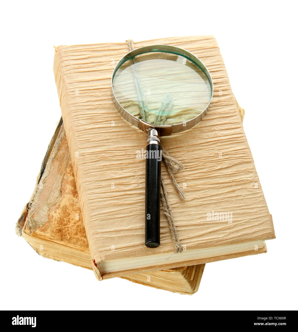 Magnifying glass and book isolated on white Stock Photo - Alamy