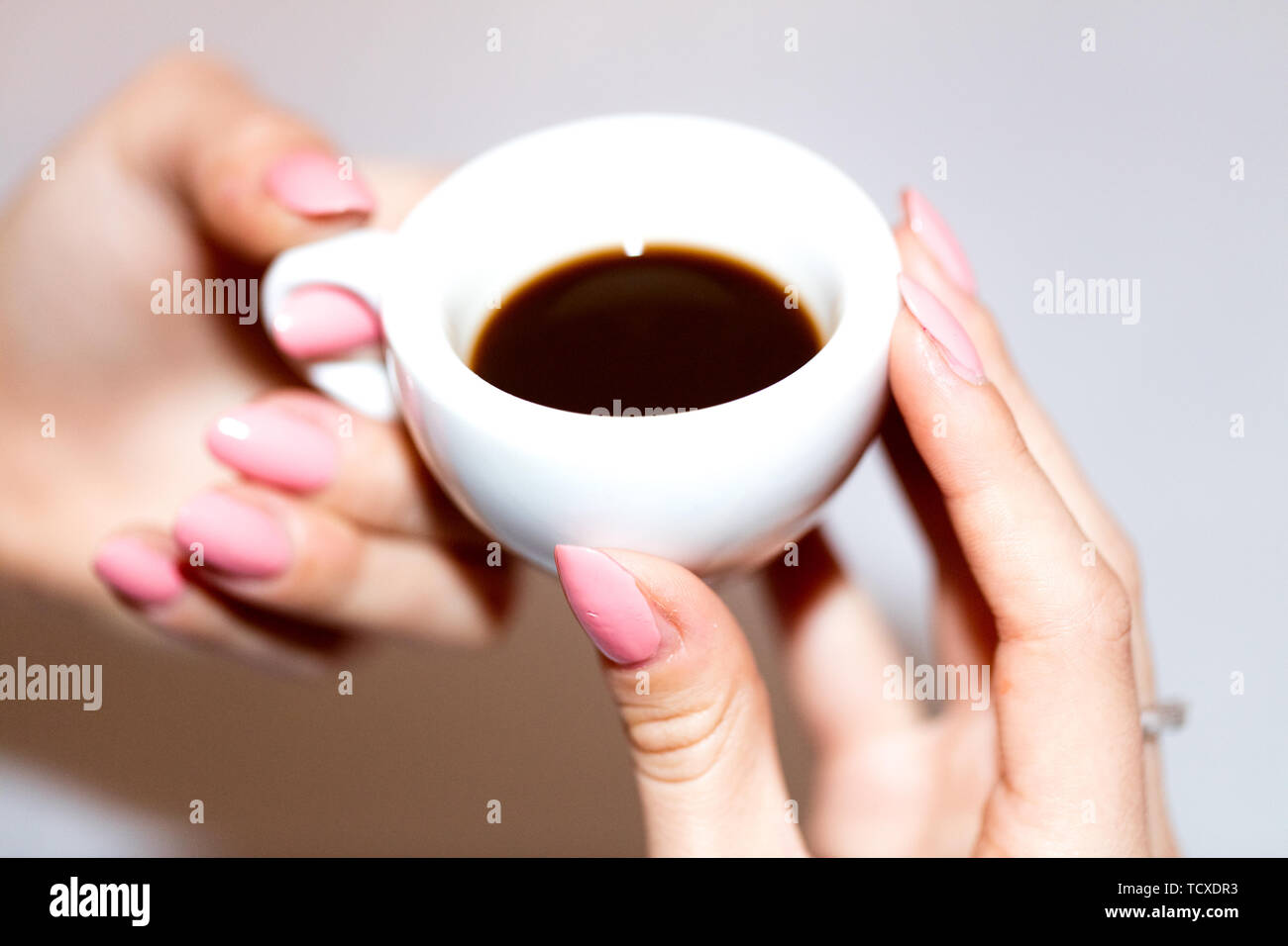Taking the neapolitan coffee in ceramic cup Stock Photo
