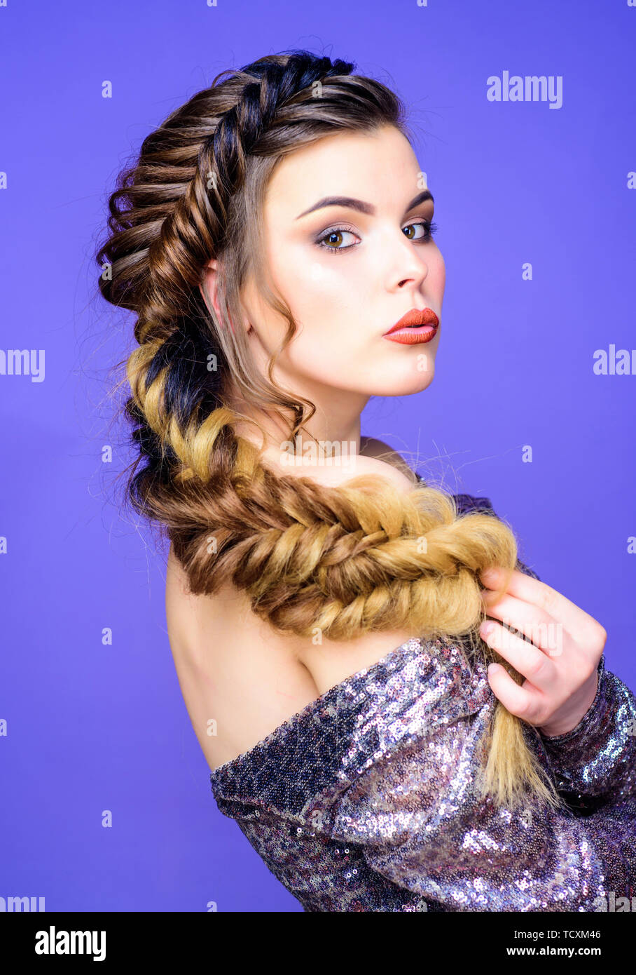 Braided hairstyle. Beautiful young woman with modern hairstyle. Beauty  salon hairdresser art. Girl makeup face braided long hair. French braid.  Professional hair care and creating hairstyle Stock Photo - Alamy