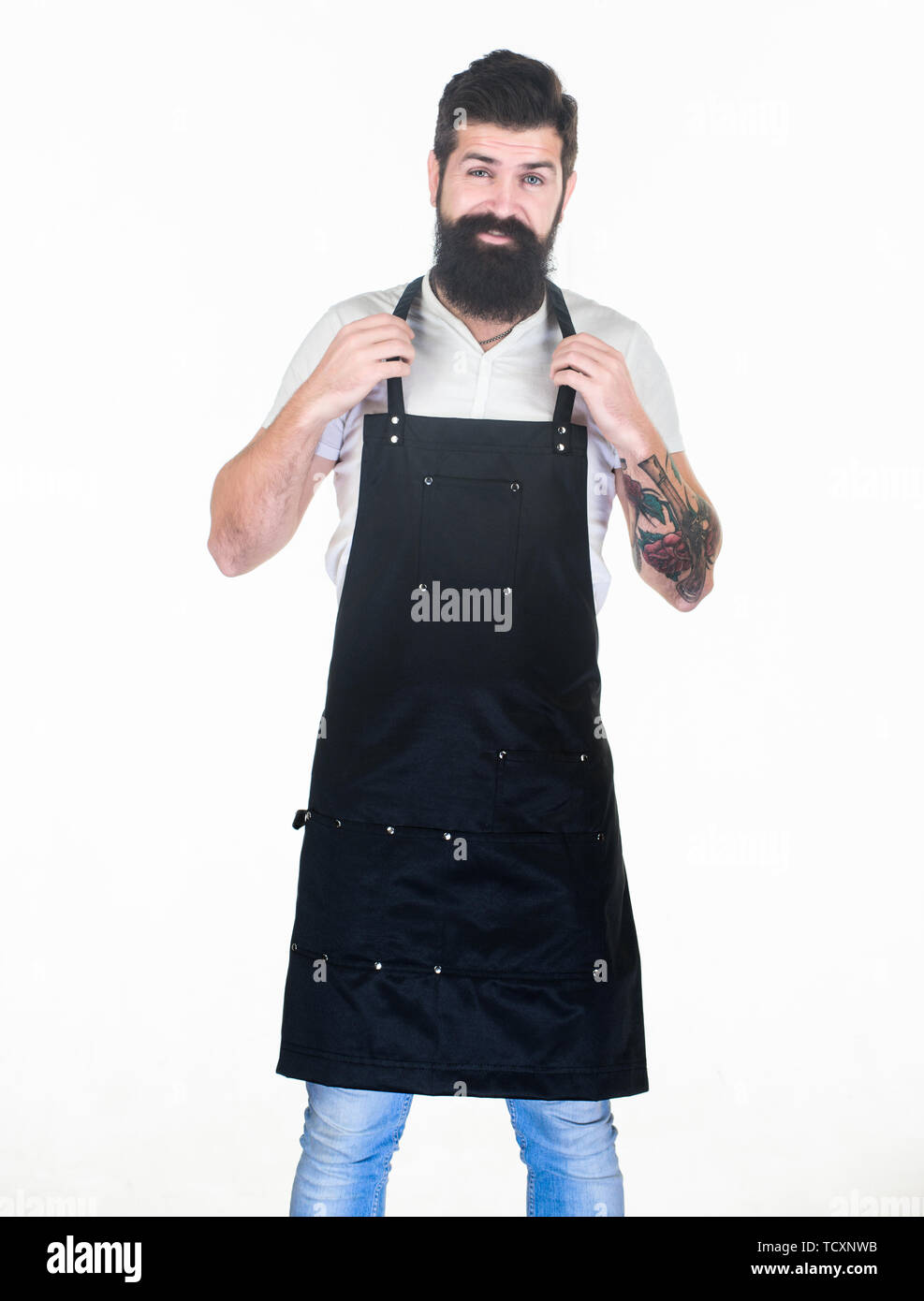 He is the best barber. Bearded man wearing barber apron. Hipster in work  apron with multiple pockets. Hair stylist in barber shop. Barbershop or  hairdressing salon Stock Photo - Alamy